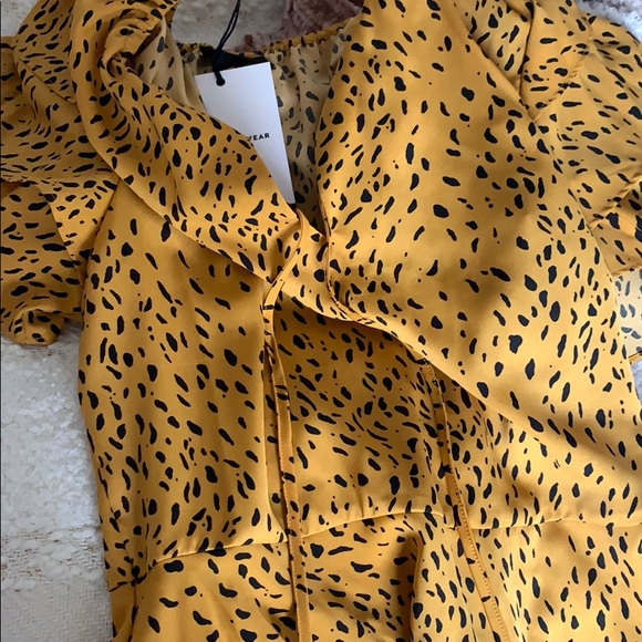 yellow animal print blouse